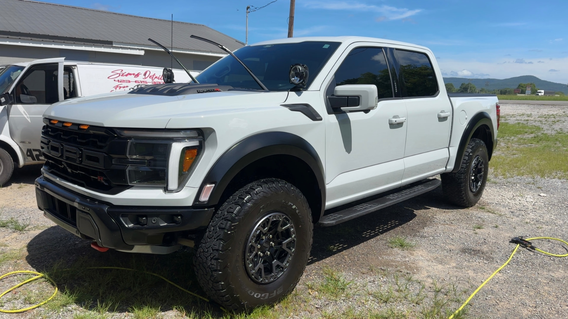 Detailed white Ford F-150 Raptor R exterior