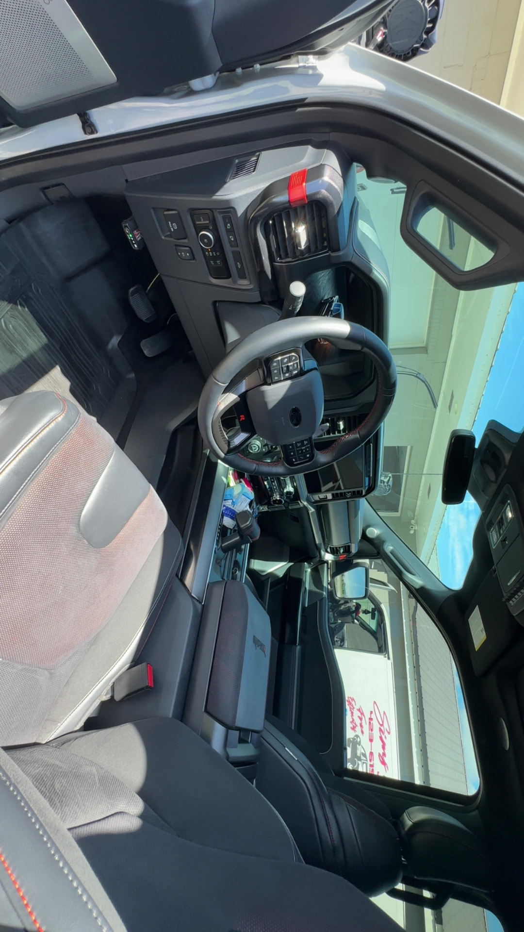 Cleaned cockpit and steering wheel of a Ford Raptor R