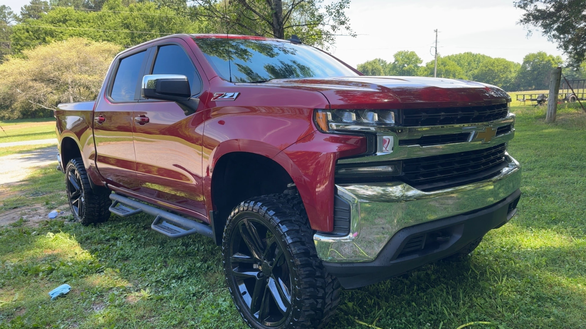 Freshly detailed red Chevrolet Silverado Z71 with glossy paint