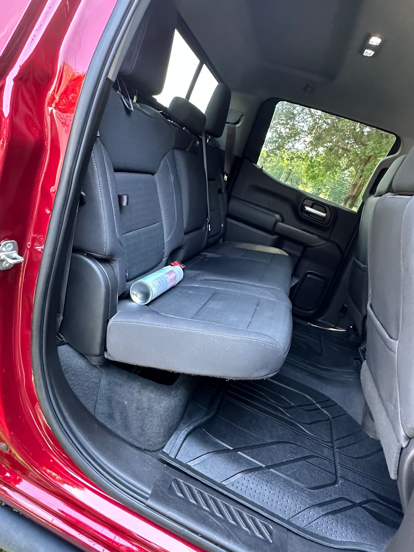 Cleaned rear interior of a red Silverado crew cab
